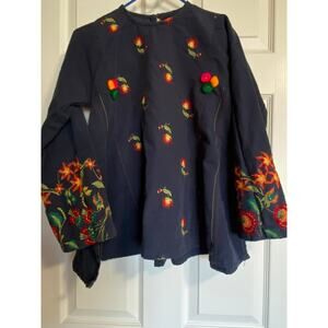 Blue blouse with flowers